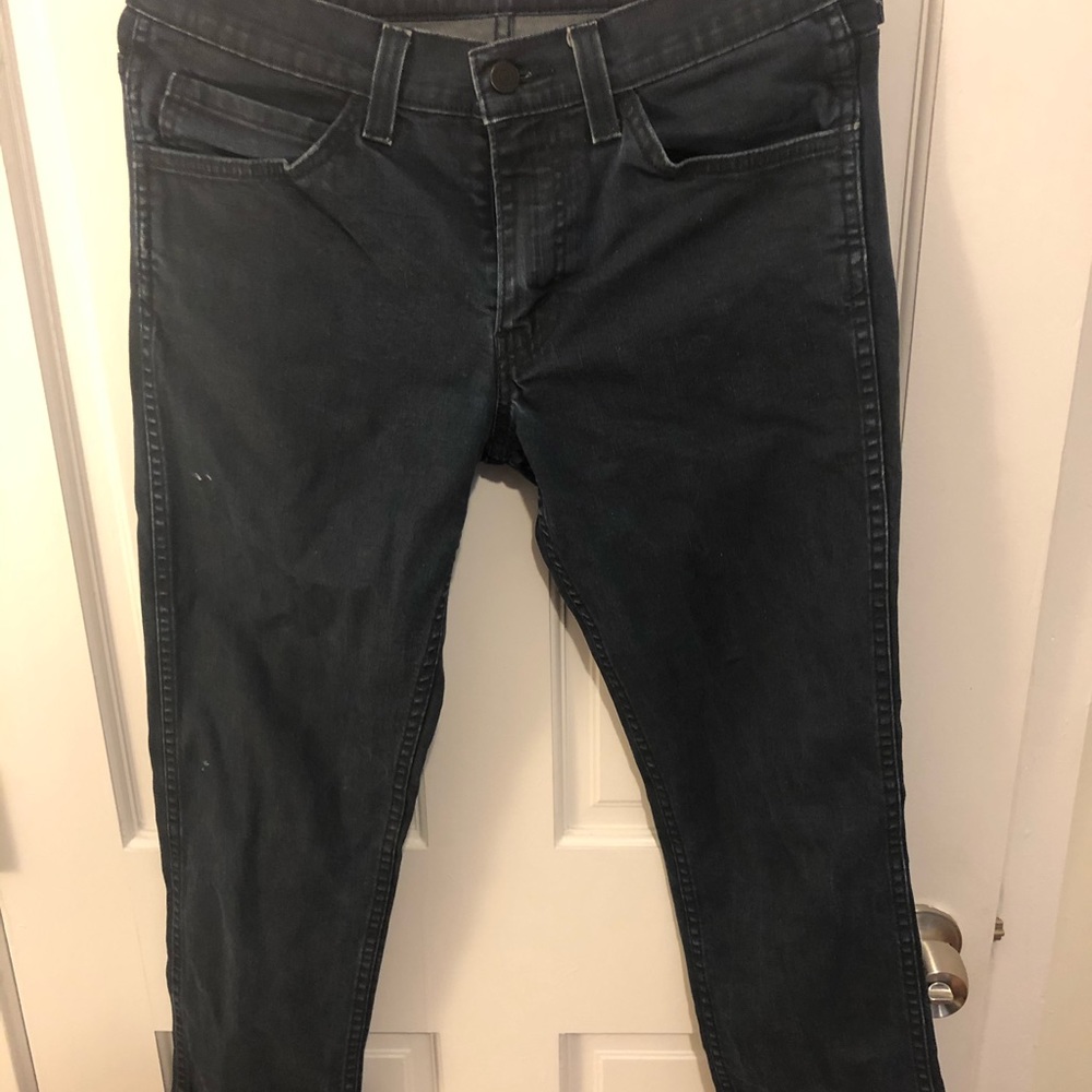 Levi’s 511 dark navy denim jeans.